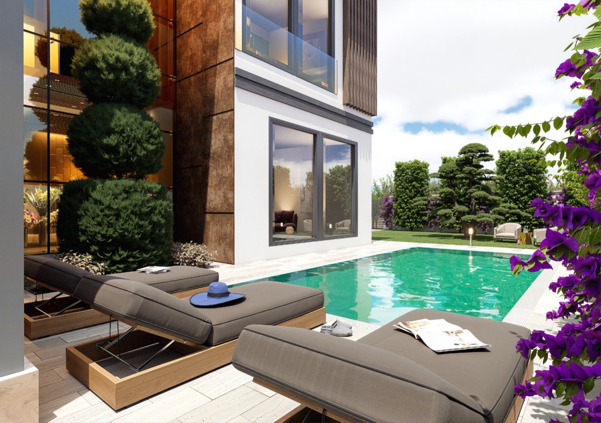 Poolside terrace with sun loungers against the timber-clad wall