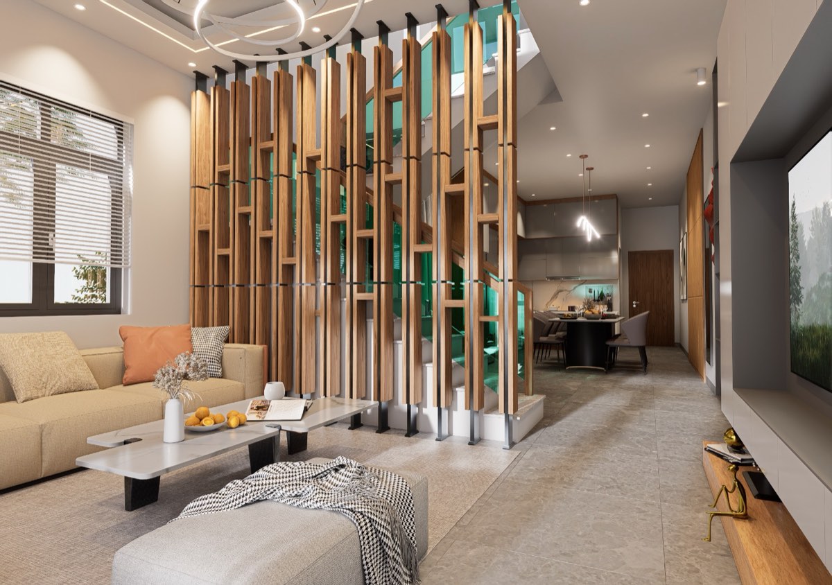 Double-height living room with a full-height timber slat screen separating the stair